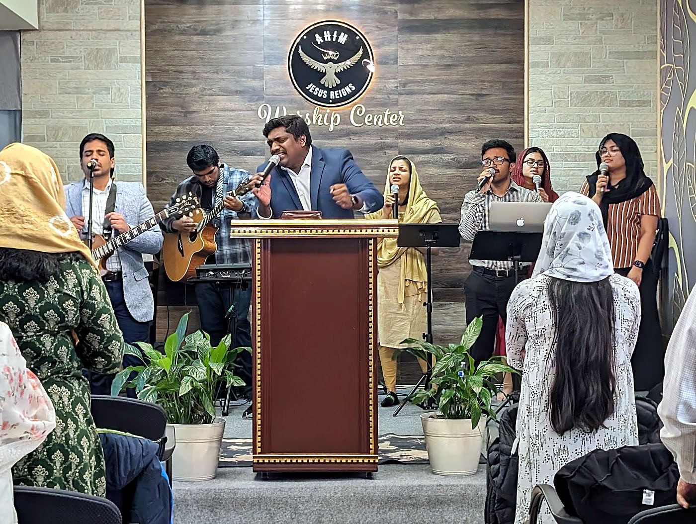The worship team leading the congregation at the Worship Center